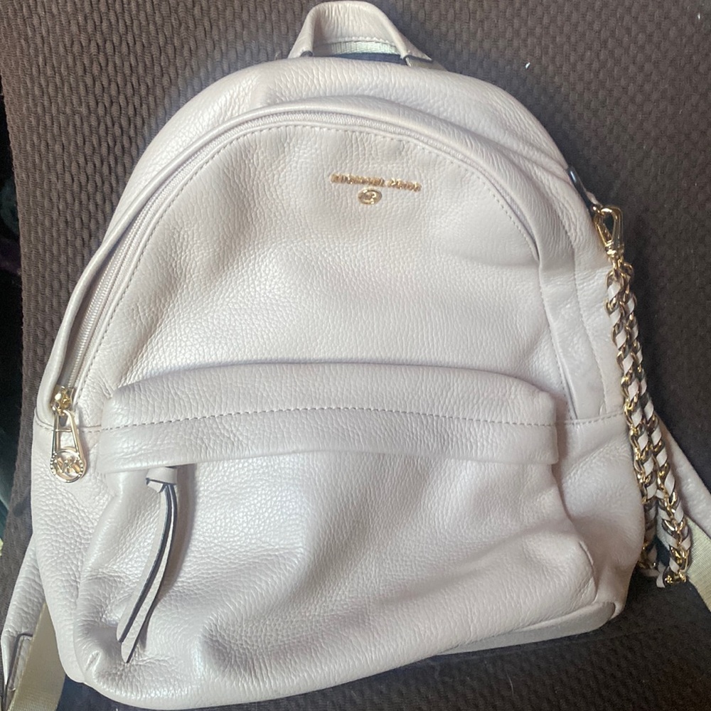 Michael Kors, backpack great for travel great for day trips great for safety....